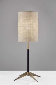 Antique Brass Metal Tripod Base With Matte Black Accent And Tall Natural Fabric Shade Table Lamp