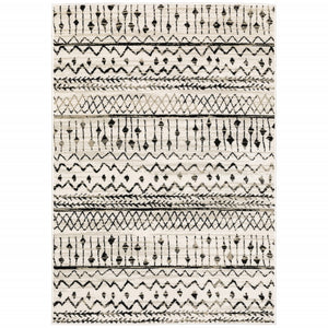 4’ X 6’ Ivory And Black Eclectic Patterns Indoor Area Rug