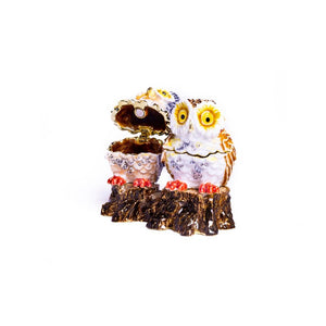 Two Owls Sitting on Tree Trunk